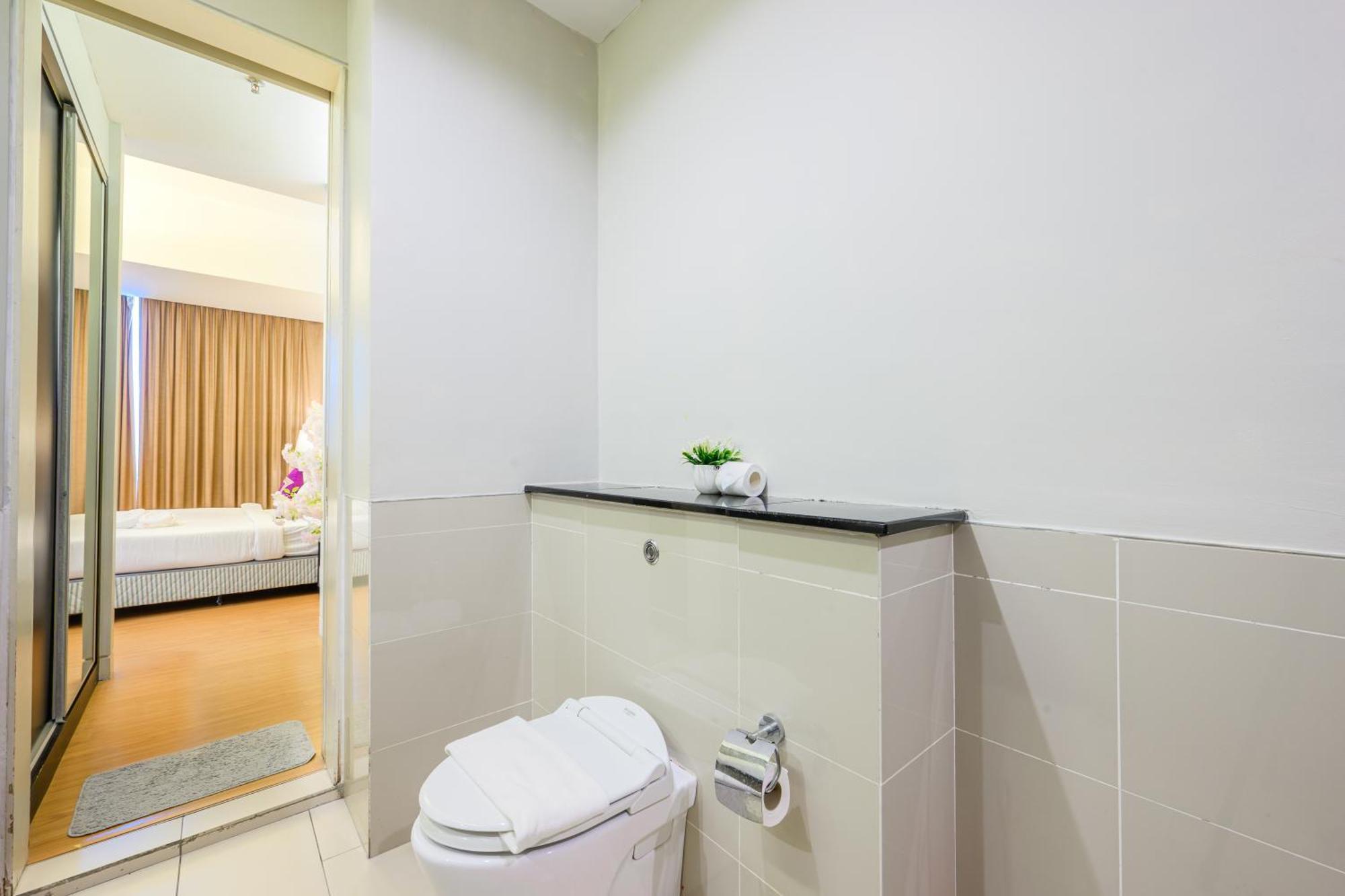 Apartemen Greystone Swiss Garden *