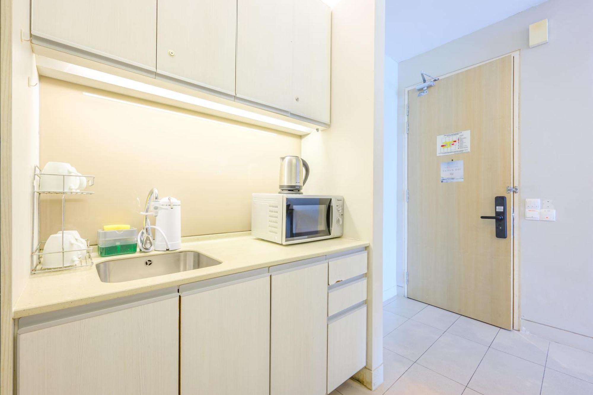 Apartemen Greystone Swiss Garden